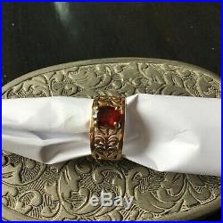 James Avery adoree 14k gold ring. Size 7, Garnet stone